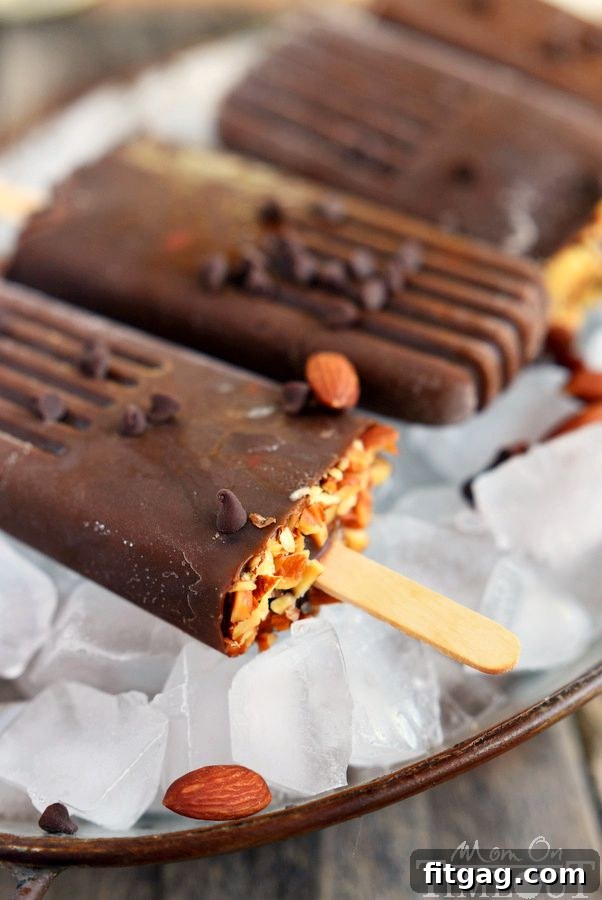 Finished Mocha Almond Fudge Pudding Pops with added toppings, glistening and ready to eat