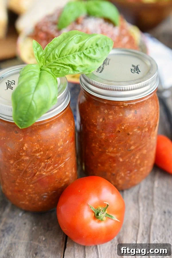 This easy homemade Spaghetti Sauce recipe is perfect for busy weeknights! Made in the slow cooker, this delicious spaghetti sauce is full of flavor and makes a large batch which is great for freezing. Enjoy with your family tonight! Make it with or without meat - your choice! // Mom On Timeout #spaghetti #sauce #recipe #dinner #easy #recipes #slowcooker #crockpot Canned spaghetti sauce substitute