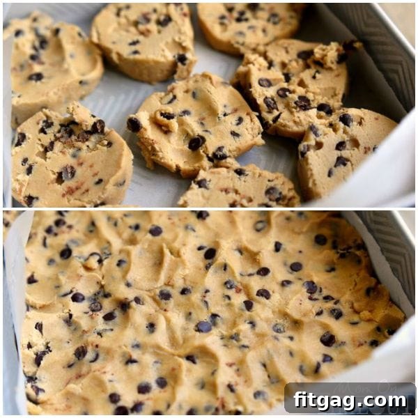 Chocolate chip cookie dough pressed evenly into a baking dish