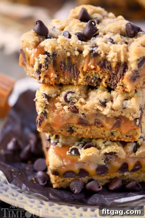 Cut Carmelitas bar with a bite taken, revealing gooey caramel